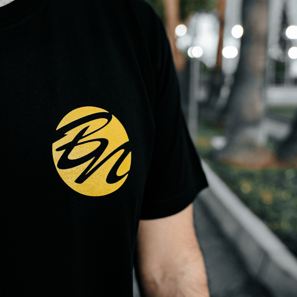 BN Sports Black T-Shirt – Metallic Gold Print